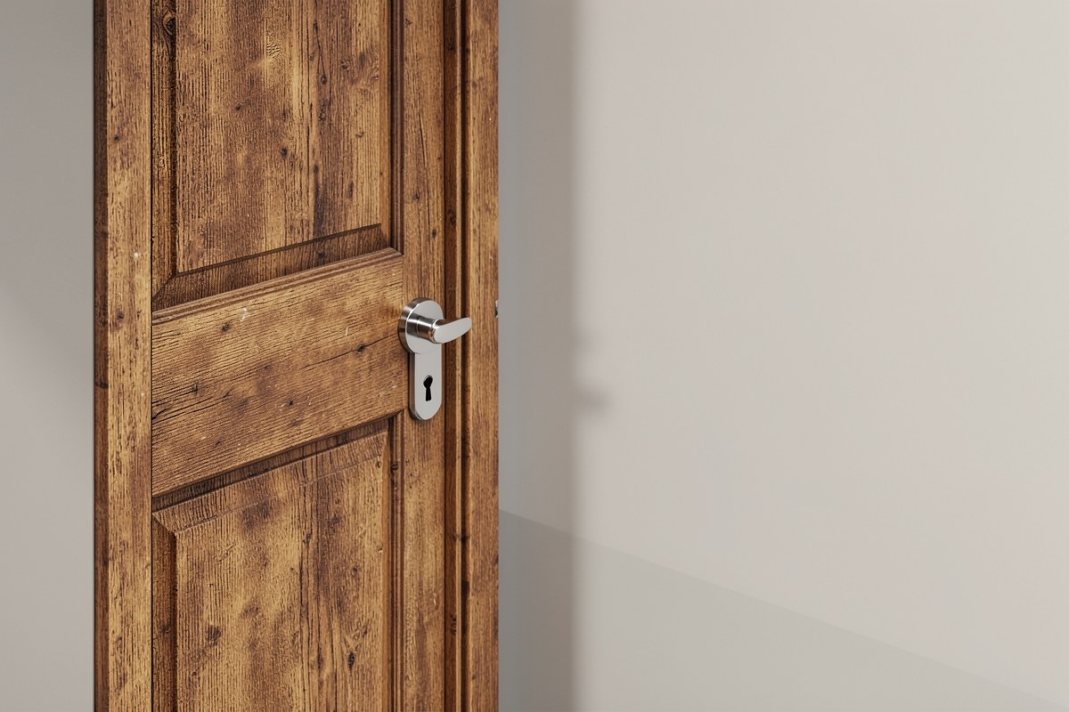 A simple door with a lock in an abstract architectural setting, representing security and privacy.